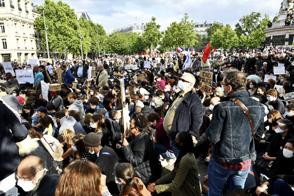 Protesters take part during a rally in the Place de la Republique square in Paris, France, against racism and police brutality in the wake of the death of George Floyd, an unarmed black man killed while apprehended by police in Minneapolis, USA, on June 09, 2020. Photo by Karim Ait Adjedjou/Avenir Pictures/Abaca/Sipa USA(Sipa via AP Images)