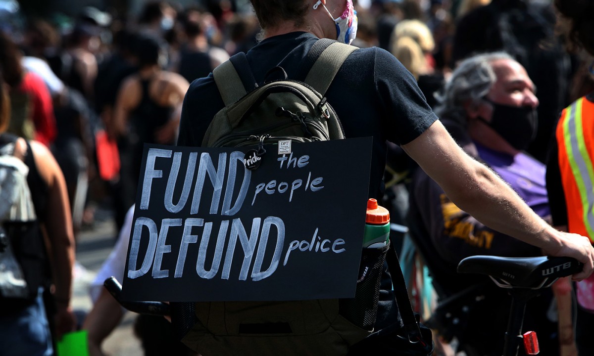 Hundreds march with the Coalition of Black Youth in Boston on June 10, 2020. The protesters marched from Nubian Square to City Hall to urge Boston City Council to reallocate Boston police funding to youth jobs programs and violence prevention, and to hire more mental health counselors in Boston Public Schools. (Photo: Barry Chin/The Boston Globe/Getty Images)