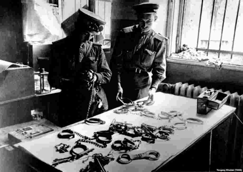 Soviet officers examine bindings inside Gestapo headquarters in Berlin. &nbsp; A pastor freed by Soviets from the Nazi prison, known as &ldquo;the house of horror,&rdquo; later wrote: &ldquo;What I experienced as sadism during those last one and a half weeks cannot be described here.&rdquo;