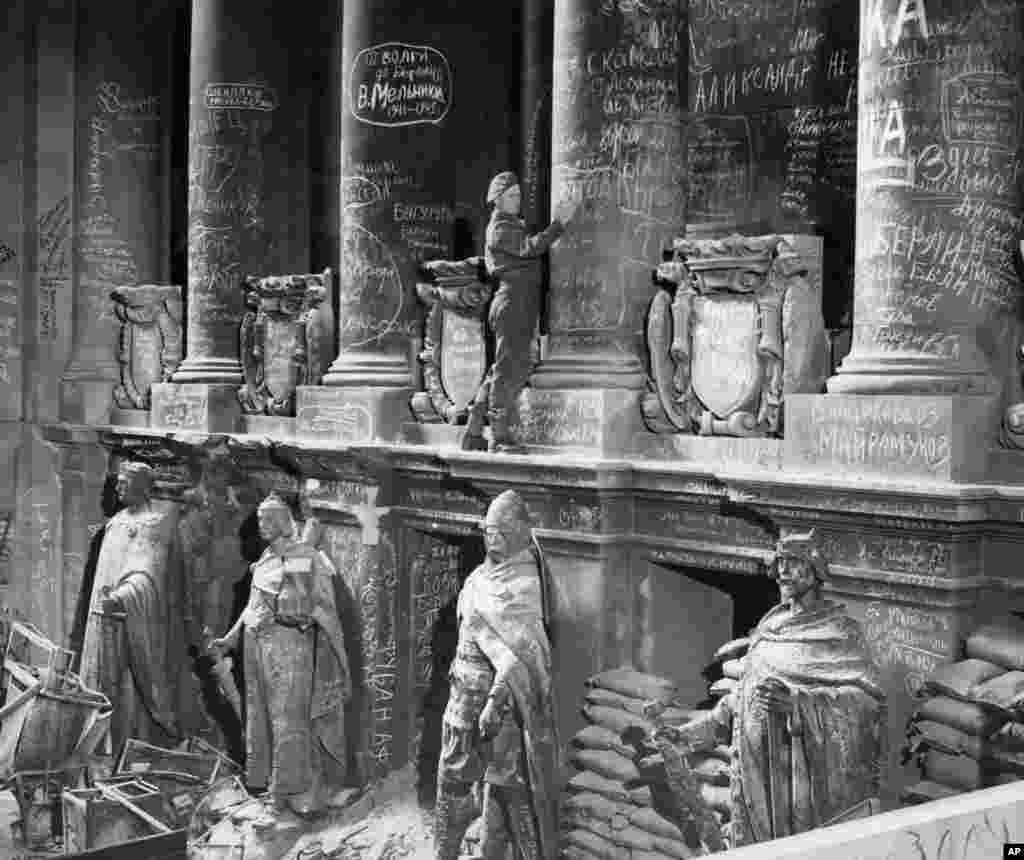 A newly arrived British soldier inside the Reichstag after it had been scrawled with messages from Soviet soldiers. &nbsp; On June 5, 1945, the governments of the U.S., Soviet Union, Britain, and France declared &ldquo;supreme authority&rdquo; over Germany and split the country, and the capital, into different zones of occupation. Thus the stage was set for the ideological battle in Europe between communism and the free world that would soon take shape as the Cold War. &nbsp; &nbsp;