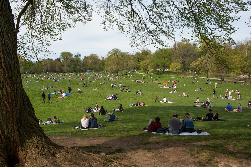 BROOKLYN, NY - MAY 2: After weeks of rain and self-isolation during the COVID-19 pandemic, New Yorkers come outside and attempt to practice social distancing on a warm weekend on May 2, 2020 in Prospect Park in Brooklyn, New York. (Photo by Andrew Lichtenstein/Corbis via Getty Images)