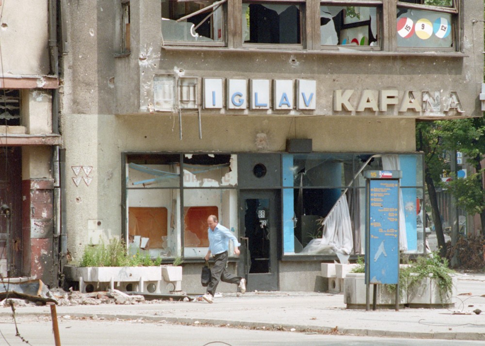 Man Running in Bombed-Out Sarajevo