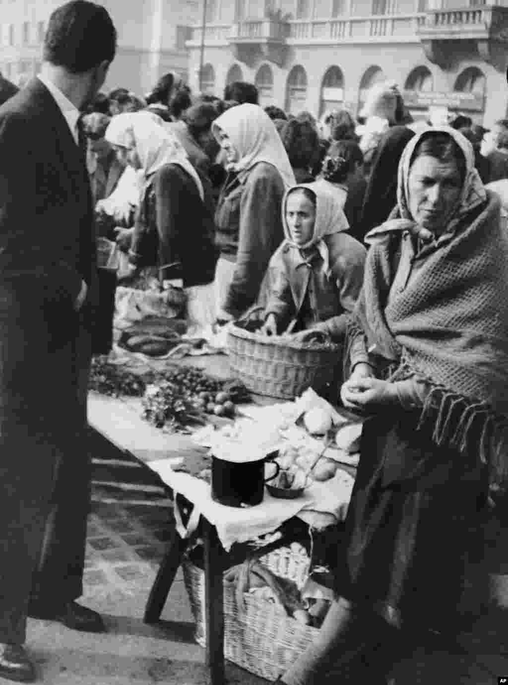 A Belgrade market in 1950, when tensions with the Soviet Union led to a trade blockade, food shortages, and fears of a military invasion. Tito at the time carried out ruthless repressions against those deemed sympathetic to the Soviet Union. Hundreds were killed in the political crackdown and thousands more sent to forced-labor camps. &nbsp;