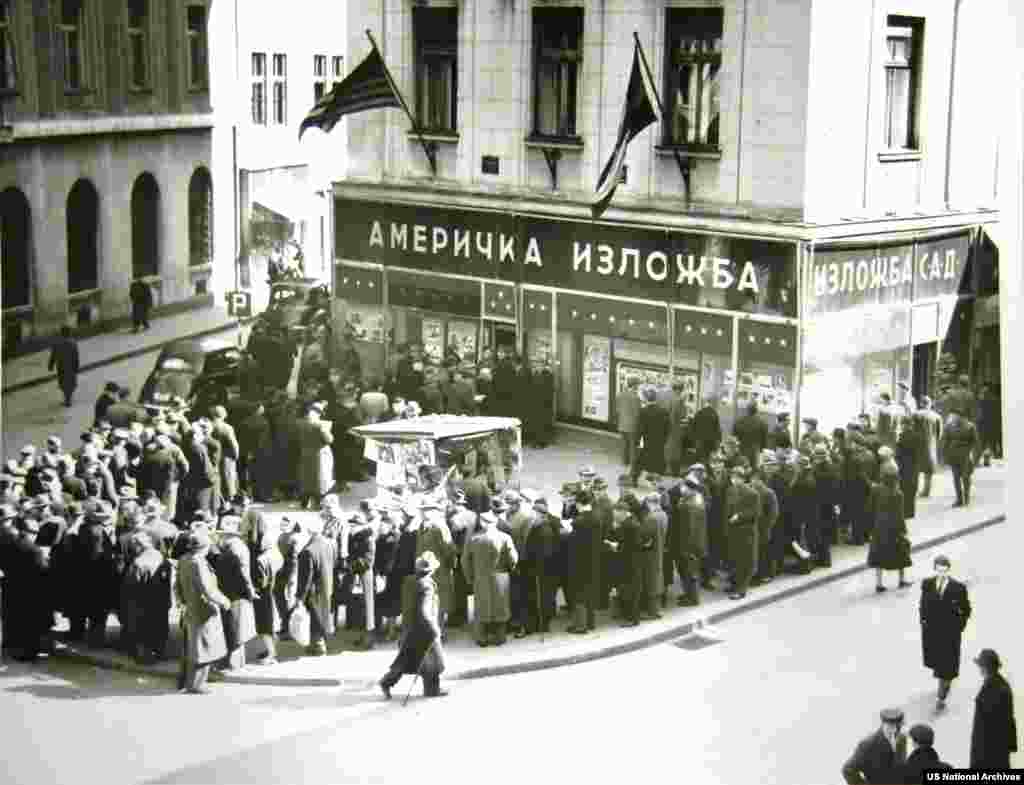 Locals in Belgrade line up outside a &quot;U.S. Information Center&quot; to read newspapers reporting the death of Stalin in 1953. &nbsp; &nbsp;