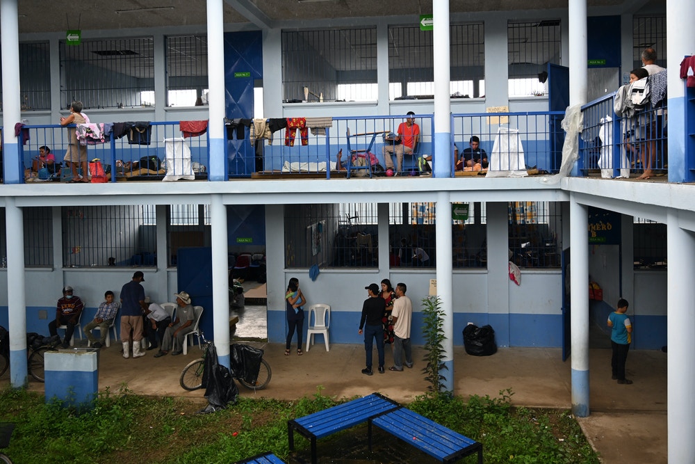 People remain in a temporary shelter after their homes were flooded due to the heavy rains caused by Hurricane Eta, now degraded to a tropical storm, in Morales, Izabal 220 km north Guatemala City, on November 7, 2020. - Scores of people have died or remain unaccounted for as the remnants of Hurricane Eta unleashed floods and triggered landslides on its deadly march across Central America. (Photo by Johan ORDONEZ / AFP) (Photo by JOHAN ORDONEZ/AFP via Getty Images)