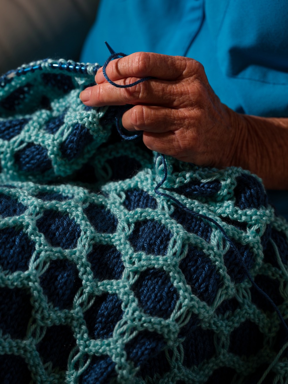 Jane Dorotik works on a blanket she is knitting, October 8, 2020.