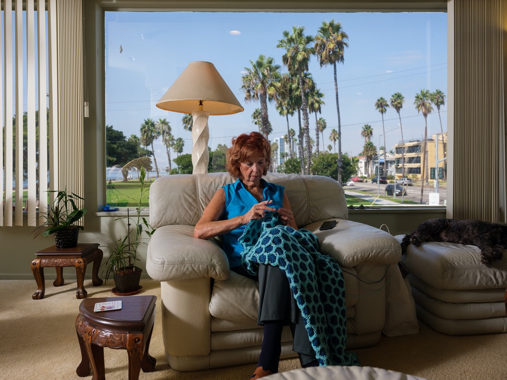 Jane Dorotik works on a blanket she is knitting while at her sister Bonnie's house in Long Beach on October 8, 2020.