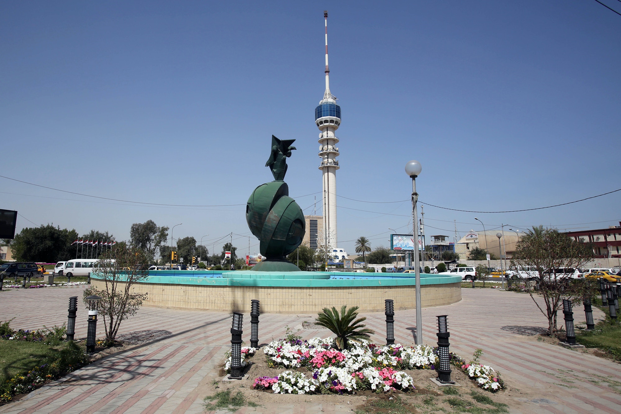 Spring flowers are planted in Nisoor Square, the site of a deadly shootout by Blackwater private security contractors in 2007, in Baghdad, Iraq, on April 15, 2015.