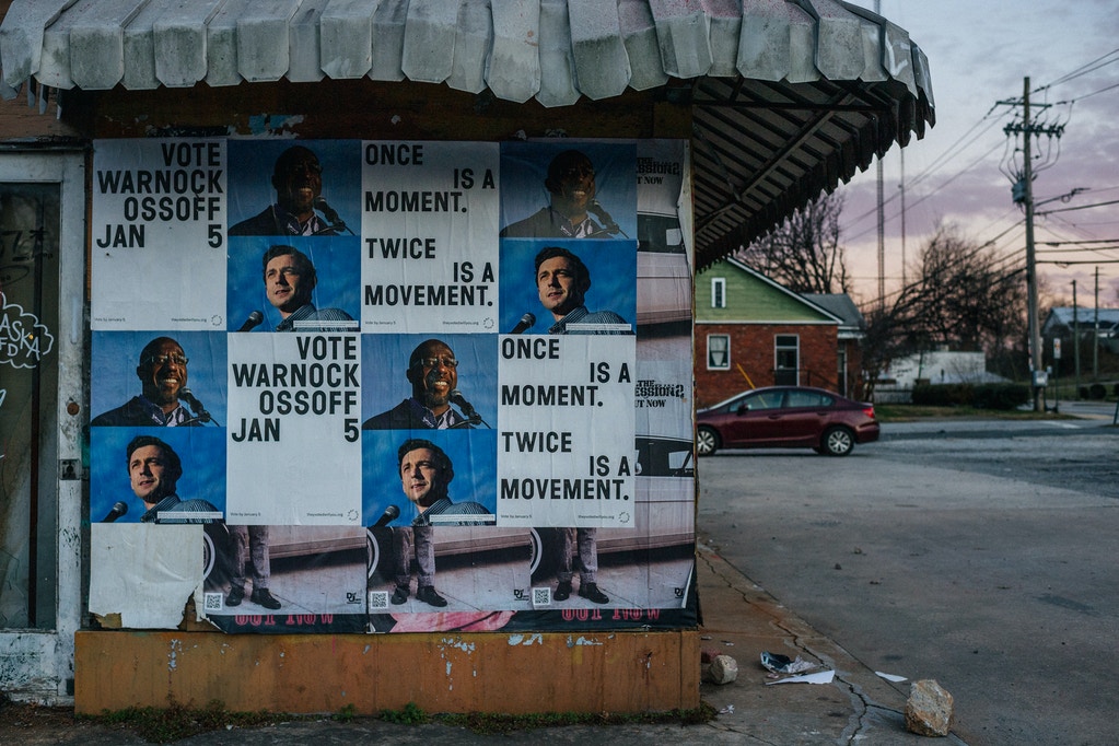 U.S. Senate campaign signs for Democratic candidates Jon Ossoff and the Rev. Raphael Warnock are shown on January 4, 2021 in Atlanta, Georgia.